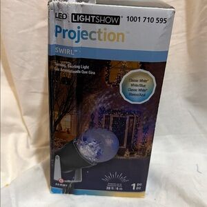 Gemmy LED LightShow NIB Box has storage wear but projector has never been used.